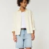 Above-the-Knee Distressed Loose Denim Shorts