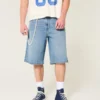 Below-the-Knee Medium Wash Super Baggy Denim Shorts Below-the-Knee Medium Wash Super Baggy Denim Shorts