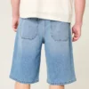 Below-the-Knee Medium Wash Super Baggy Denim Shorts Below-the-Knee Medium Wash Super Baggy Denim Shorts