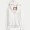 Holiday Vault Release Sherpa-Lined Zip-Up Logo Graphic Hoodie Holiday Vault Release Sherpa-Lined Zip-Up Logo Graphic Hoodie
