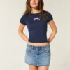 Low-Rise Embroidered Bow Denim Mini Skort Low-Rise Embroidered Bow Denim Mini Skort