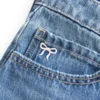 Low-Rise Embroidered Bow Denim Mini Skort Low-Rise Embroidered Bow Denim Mini Skort