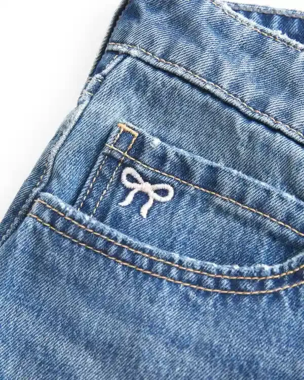 Low-Rise Embroidered Bow Denim Mini Skort Low-Rise Embroidered Bow Denim Mini Skort
