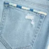Low-Rise Ripped Light Wash Embroidered Bootcut Jeans Low-Rise Ripped Light Wash Embroidered Bootcut Jeans