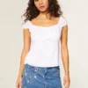 Medium Wash Embroidered Chain Denim Mini Skort Medium Wash Embroidered Chain Denim Mini Skort