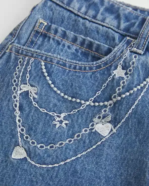 Medium Wash Embroidered Chain Denim Mini Skort Medium Wash Embroidered Chain Denim Mini Skort