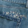 Medium Wash Embroidered Denim Mini Skort Medium Wash Embroidered Denim Mini Skort