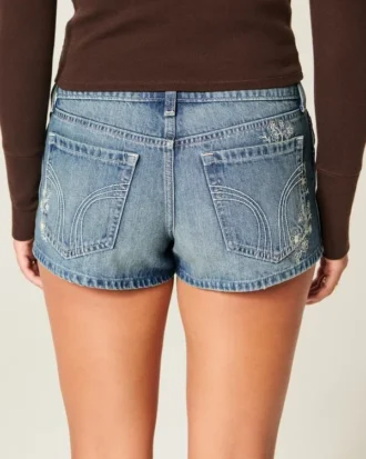 Ultra Low-Rise Medium Wash Floral Embroidered Denim Mini Shorts